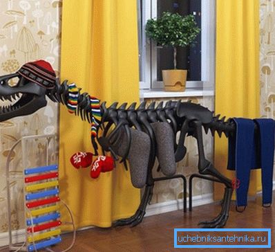 Elektrisk dekorativ radiator i form av en dinosaurie