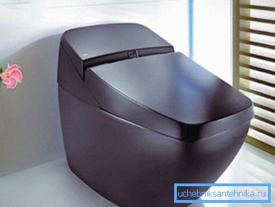 En högteknologisk brun toalettskål med en lila nyans passar perfekt in i en minimalistisk design. En högteknologisk brun toalettskål med en lila nyans passar perfekt in i en minimalistisk design.